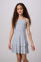 Glitter Bow Back Tiered Dress in silver.