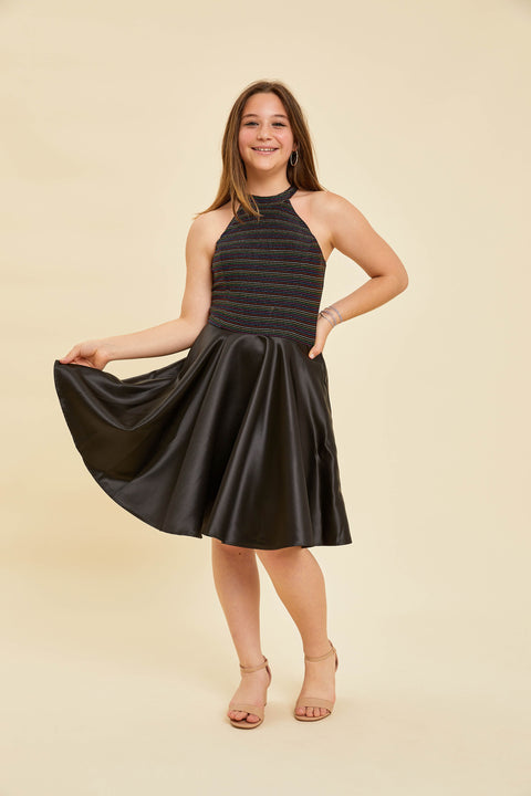 Halter style fit and flare dress with a stretchy, glitter bodice and non-stretch satin skirt in fuchsia pink.