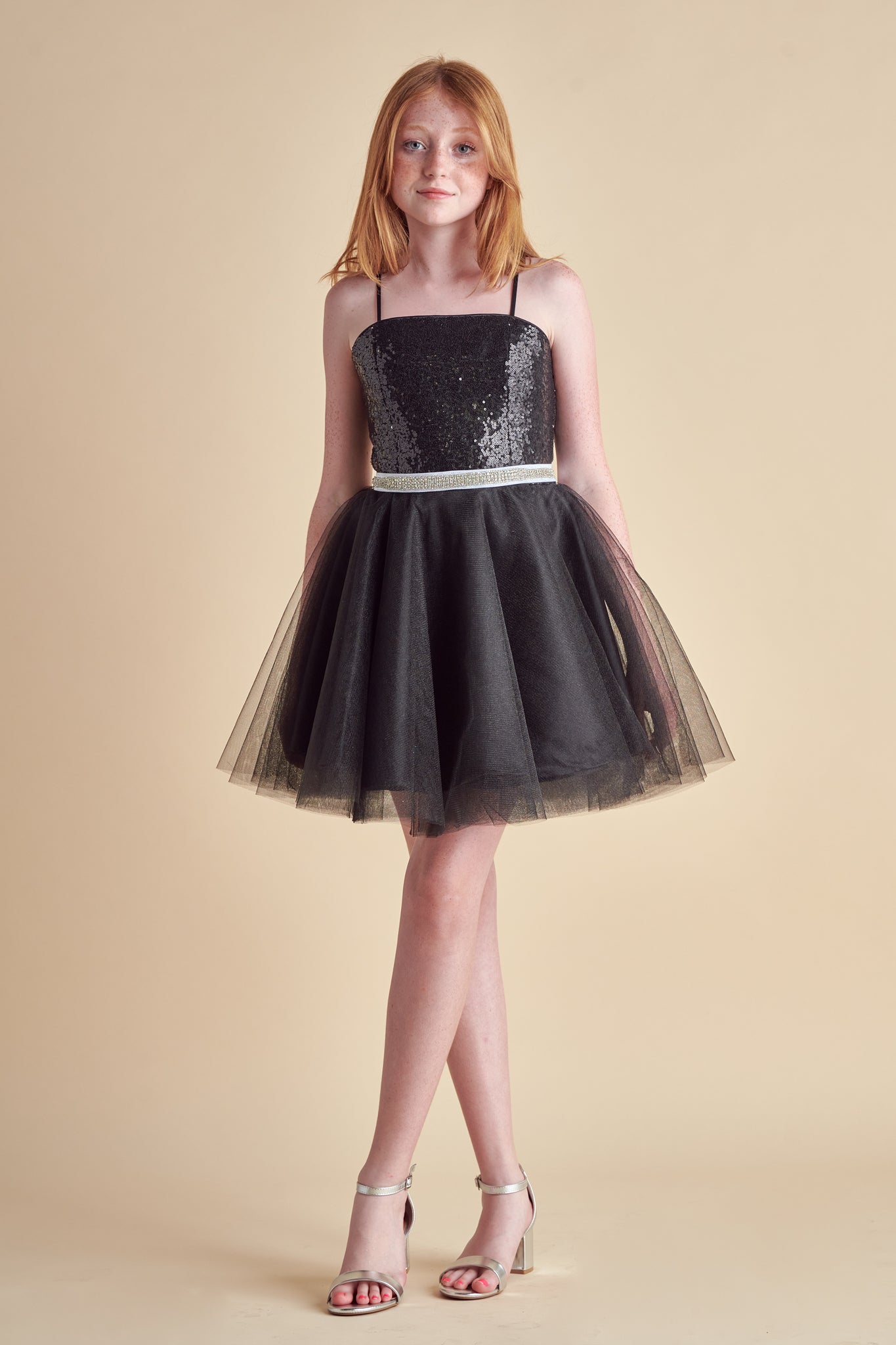 Ginger in a black tulle party dress