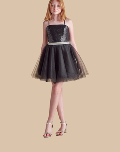 Ginger in a black tulle party dress.