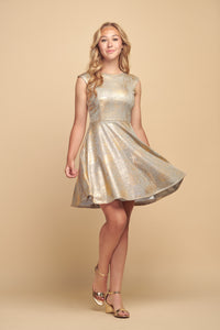 Blonde girl in a cap sleeve metallic fit and flare dress featured in gold with gold shoe.