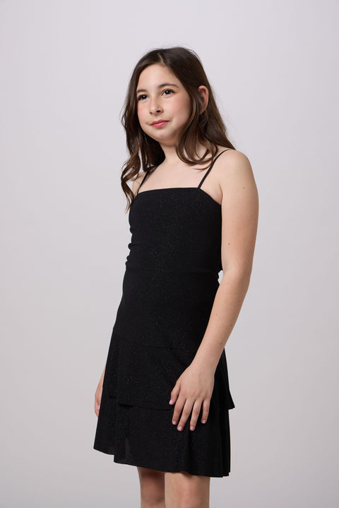Glitter Bow Back Tiered Dress in black.