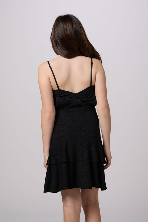 Glitter Bow Back Tiered Dress in black.