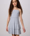 Glitter Bow Back Tiered Dress in silver.