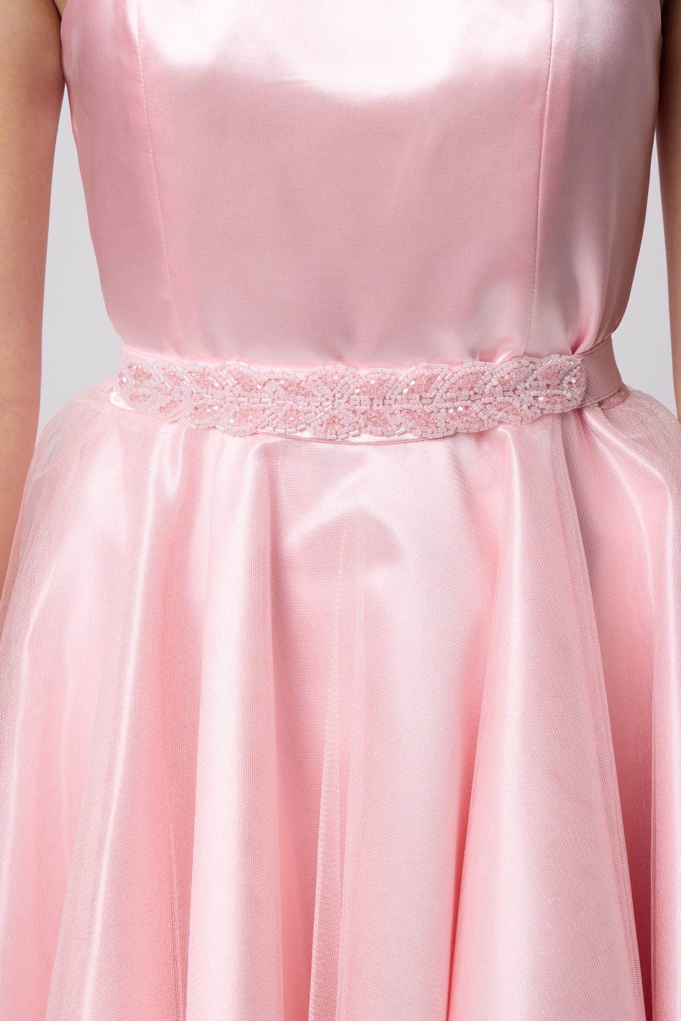 Light pink beaded belt.