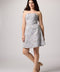 Brunette girl in an Un Deux Trois silver beaded dress.