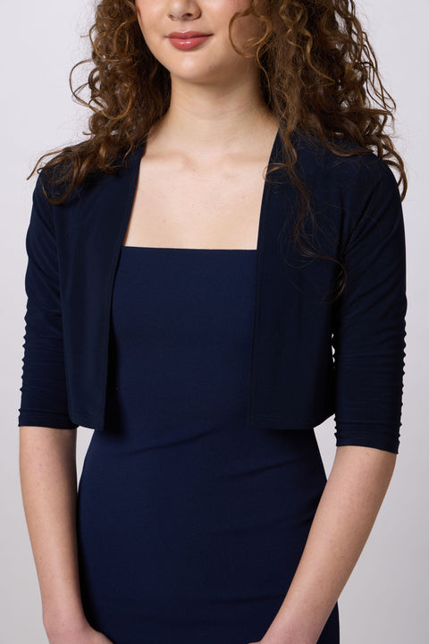 Girl in a navy blue bolero jacket