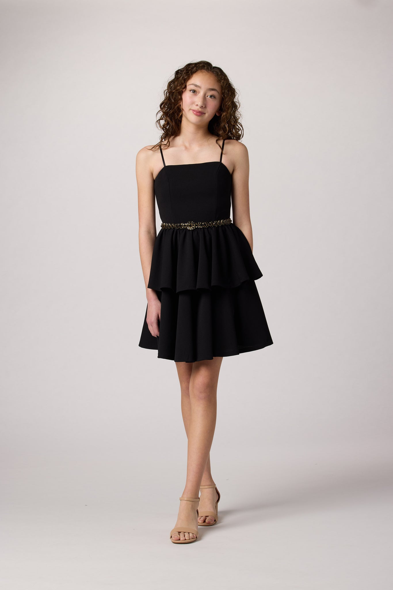 Black tired dress with belt.