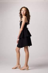 Black tired dress with belt.