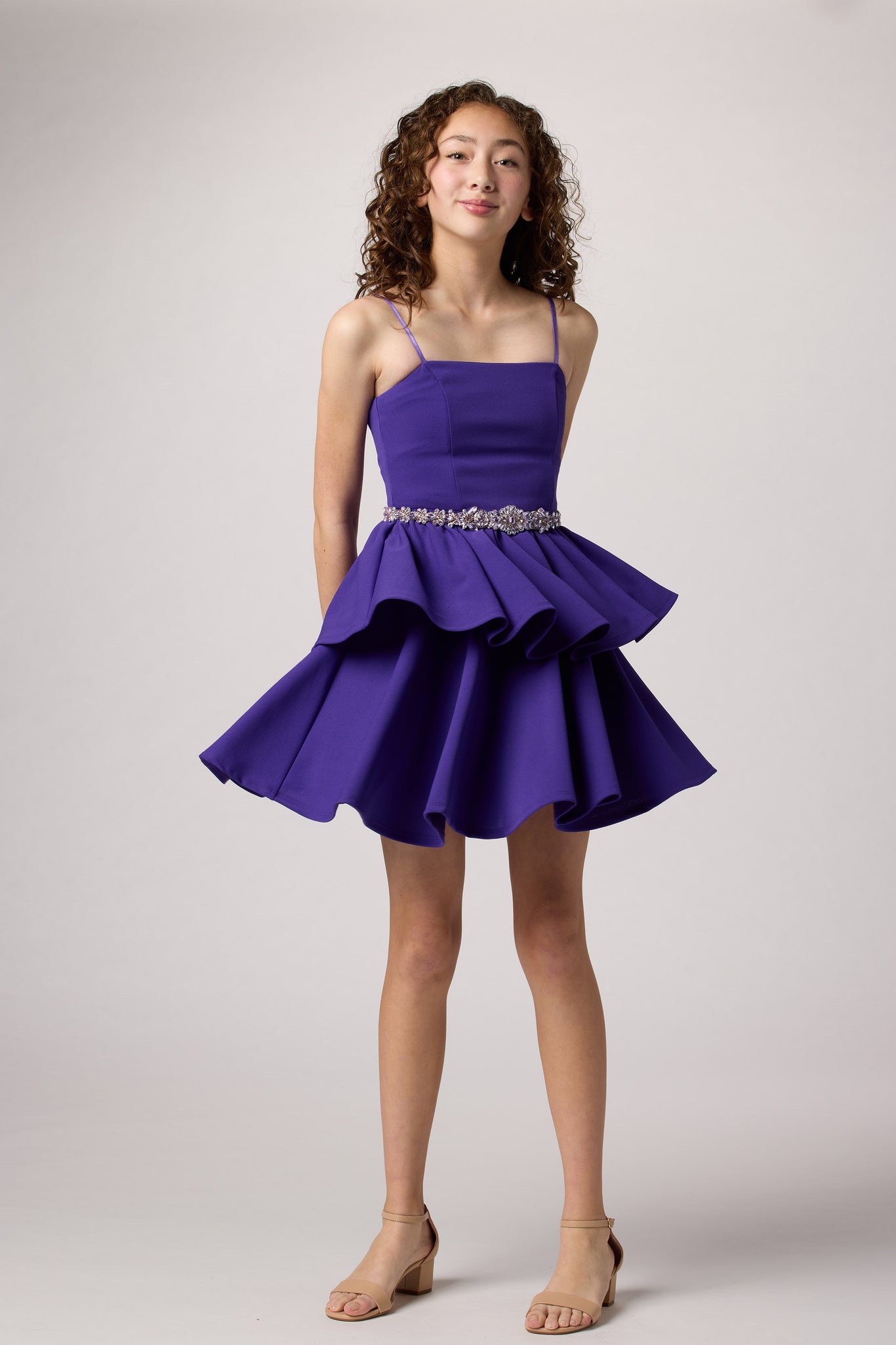 Purple tired dress with belt.