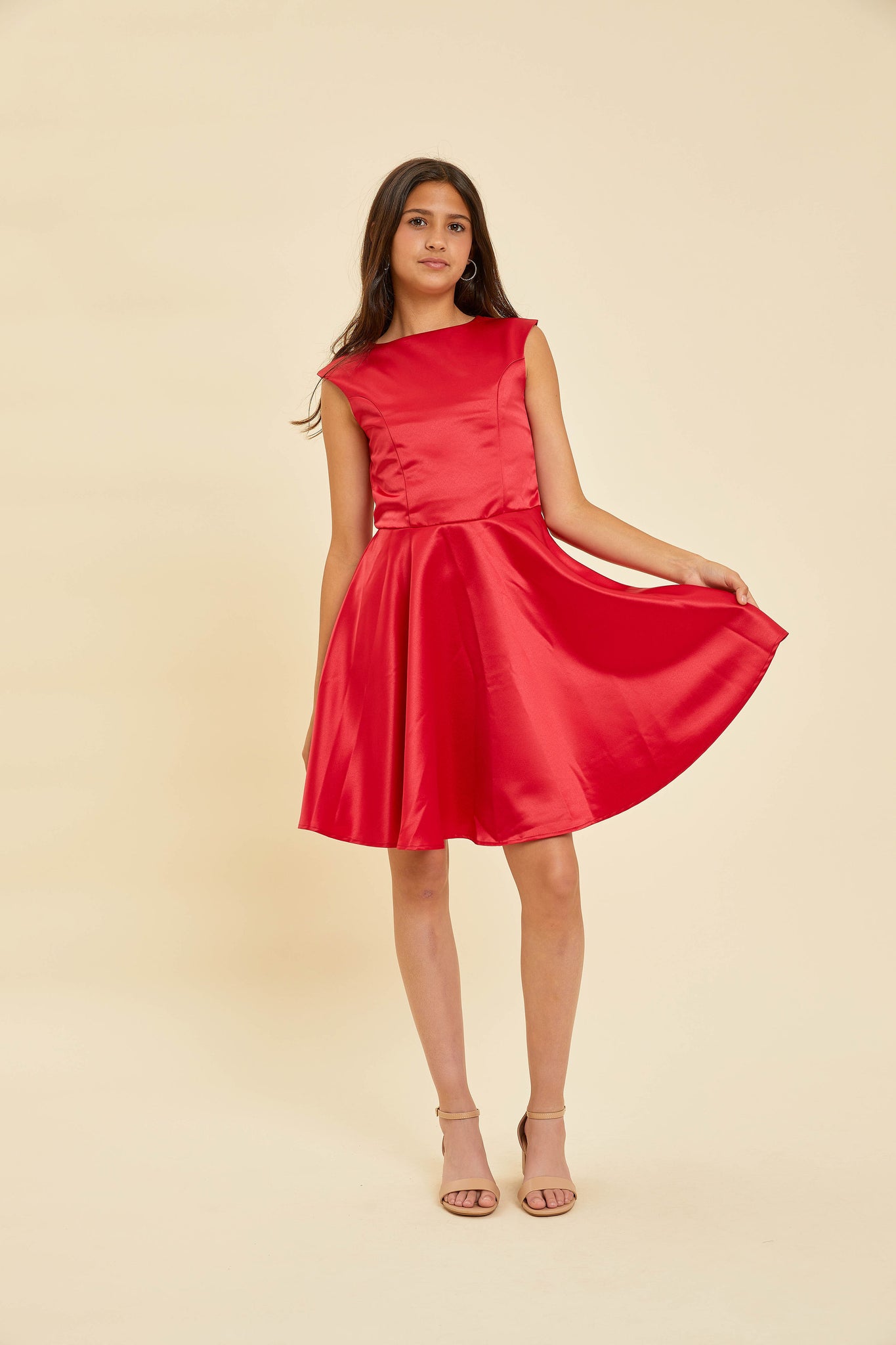 Brunette in a red satin dress.