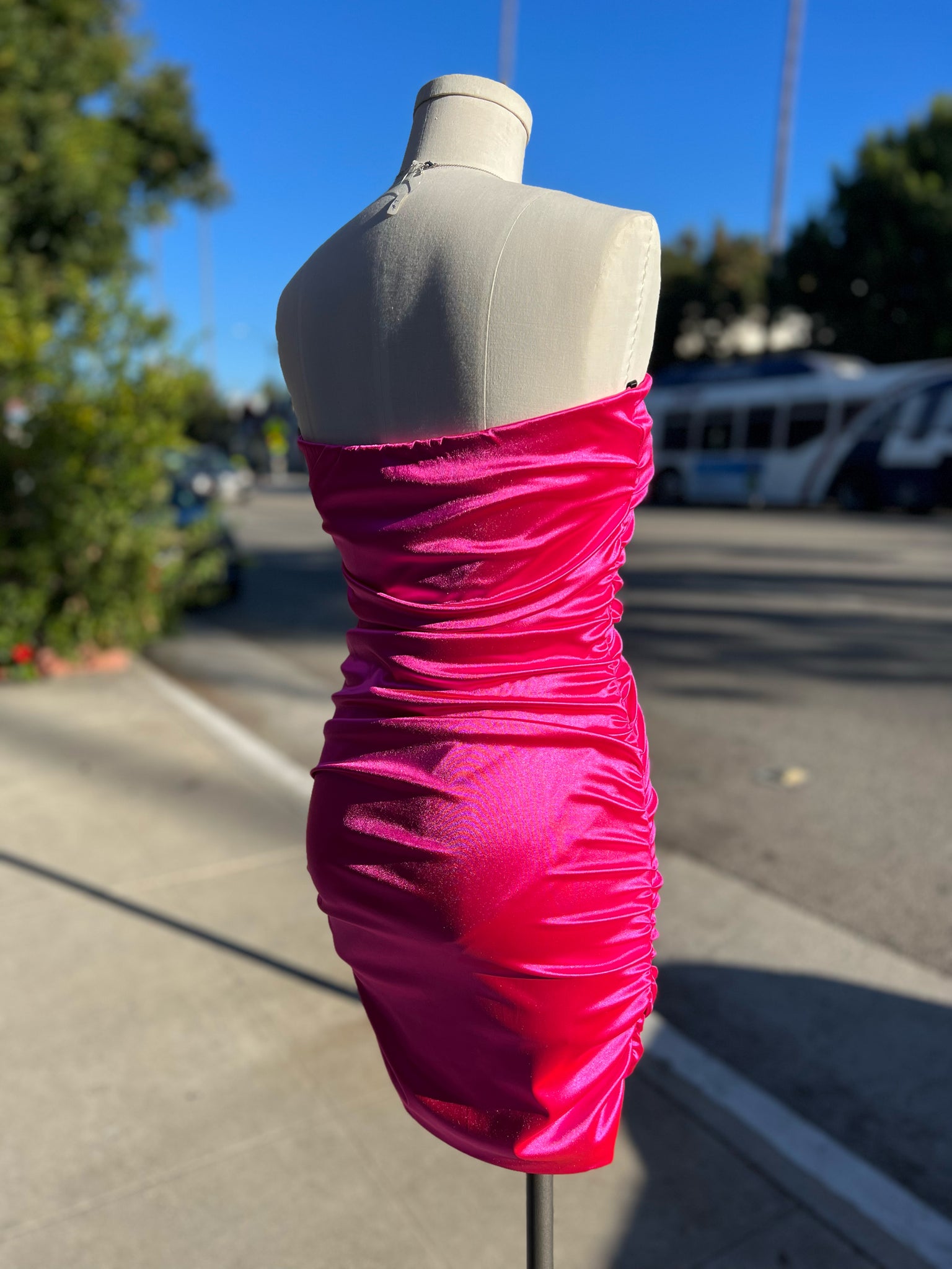 strapless hot pink ruched dress in satin