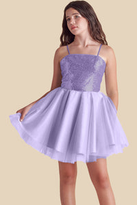 This is sequin bodice dress in lilac purple with full tulle skirt with adjustable straps. Hits above the knee with zipper back detailing. This perfect bat mitzvah dress or party outfit for any girl.
