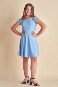 The flutter sleeve dress in light blue with full circle skirt, flutter shoulder detailing and ruffle in back.