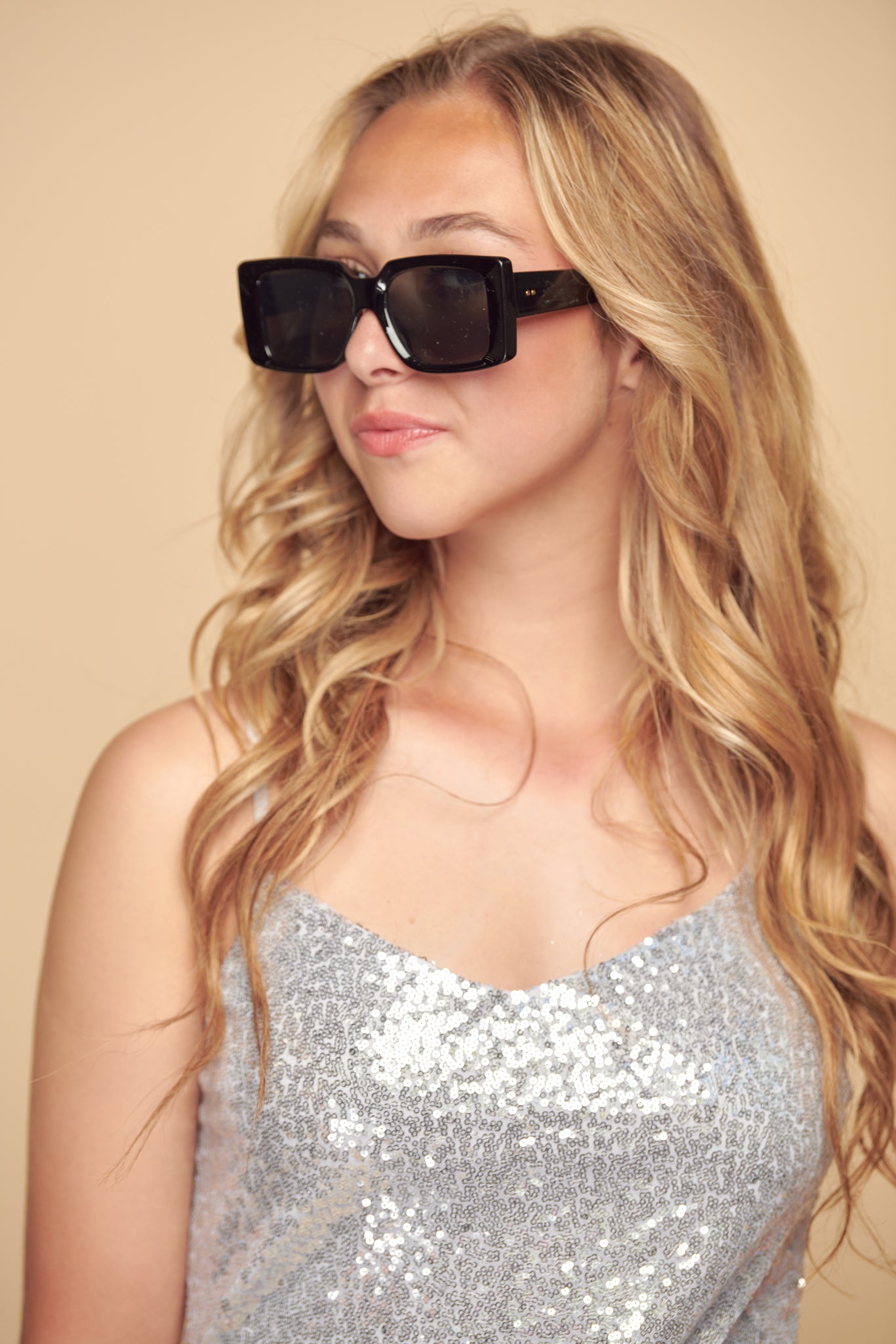 Black square large sunglasses on blonde girl.